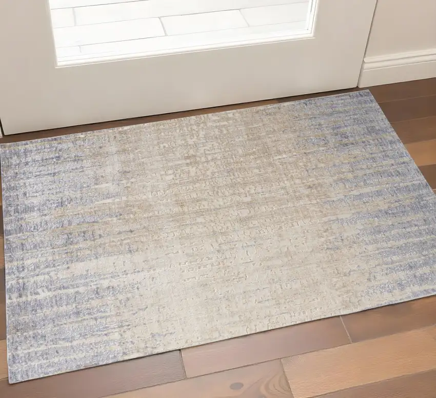 Tan And Blue Abstract Distressed Area Rug Photo 1