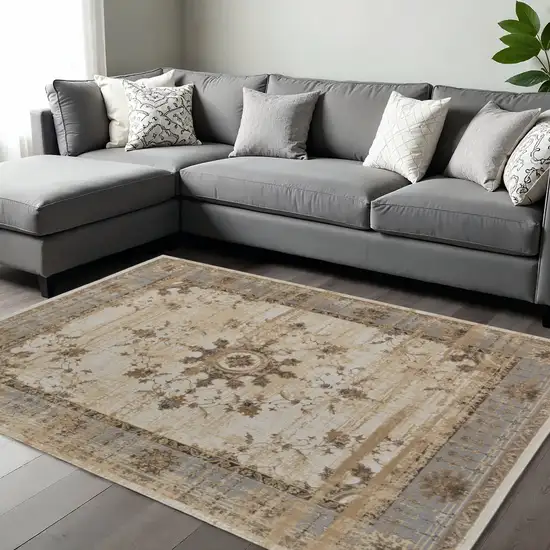 Tan Brown And Gray Oriental Distressed Area Rug Photo 1
