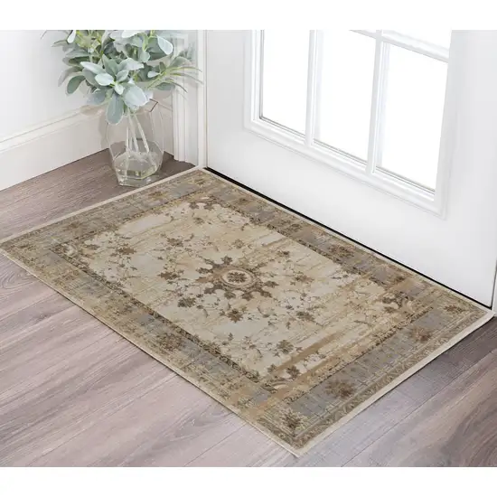 Tan Brown And Gray Power Loom Distressed Area Rug Photo 1