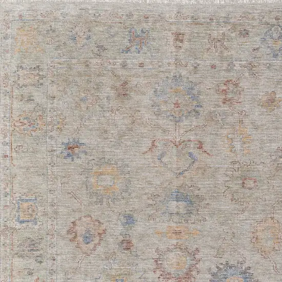 Tan Brown and Blue Floral Hand Woven Distressed Area Rug With Fringe Photo 9