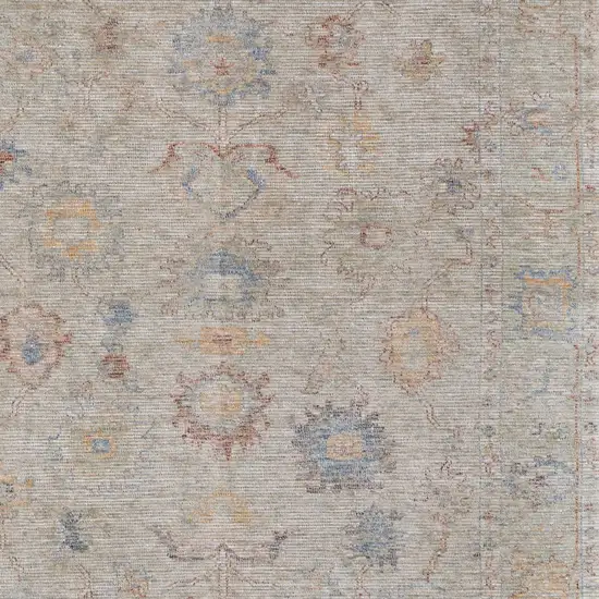 Tan Brown and Blue Floral Hand Woven Distressed Area Rug With Fringe Photo 9
