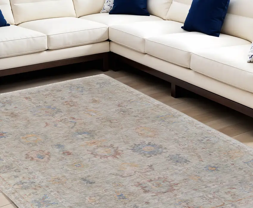 Tan Brown and Blue Floral Hand Woven Distressed Area Rug With Fringe Photo 1