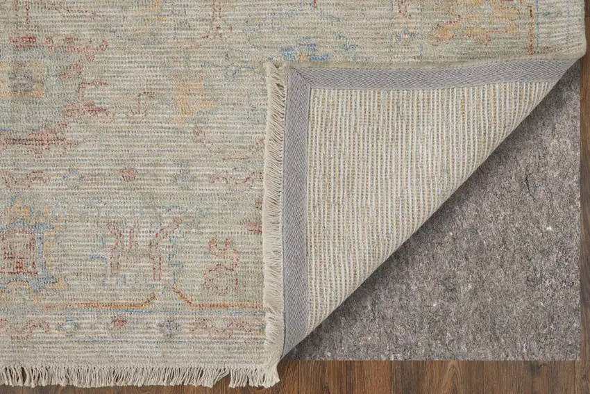 Tan Brown and Blue Floral Hand Woven Distressed Area Rug With Fringe Photo 9