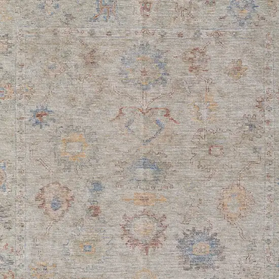 Tan Brown and Blue Floral Hand Woven Distressed Area Rug With Fringe Photo 9