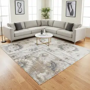 Photo of Tan Floral Distressed Area Rug