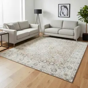 Photo of Tan Floral Distressed Area Rug