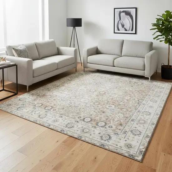 Tan Floral Distressed Area Rug Photo 1