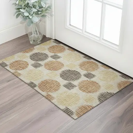 Tan Gold And Brown Geometric Washable Area Rug With UV Protection Photo 1