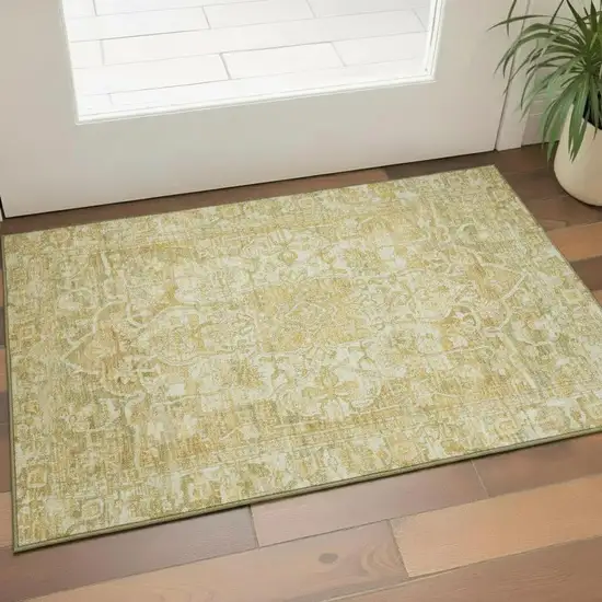 Tan Gold And Ivory Oriental Washable Area Rug With UV Protection Photo 2