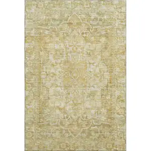 Photo of Tan Gold And Ivory Oriental Washable Area Rug With UV Protection
