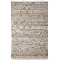 Photo of Tan Gray And Ivory Geometric Hand Woven Stain Resistant Area Rug With Fringe