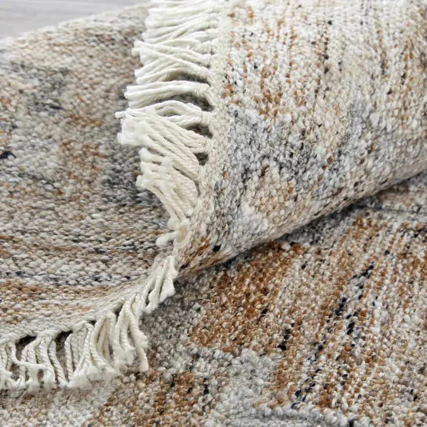 4' X 6' Tan and Gray Geometric Hand Woven Area Rug With Fringe Photo 8