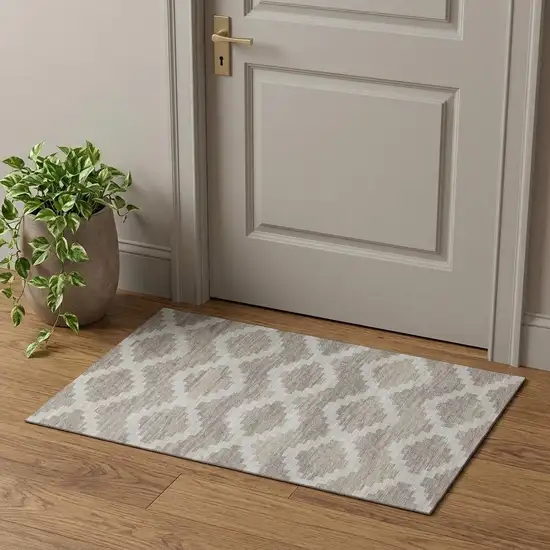 Tan Ivory And Beige Tribal Washable Area Rug With UV Protection Photo 1