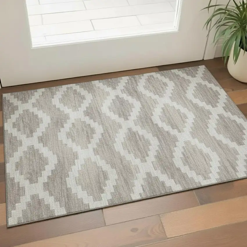 Tan Ivory And Beige Tribal Washable Area Rug With UV Protection Photo 1