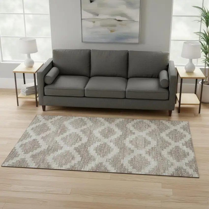 Tan Ivory And Beige Tribal Washable Area Rug With UV Protection Photo 1