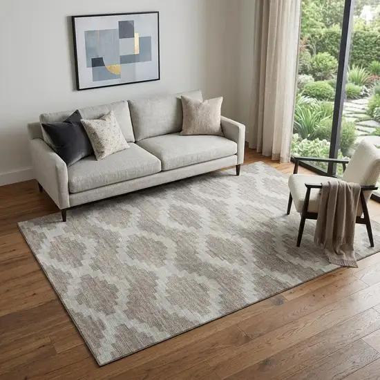 Tan Ivory And Beige Tribal Washable Area Rug With UV Protection Photo 1