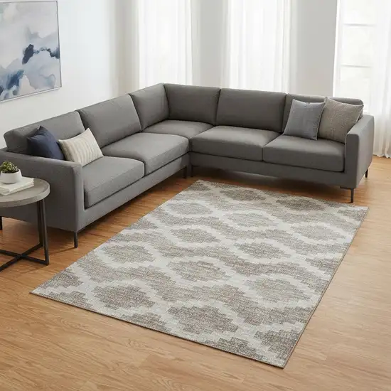 Tan Ivory And Beige Tribal Washable Area Rug With UV Protection Photo 1