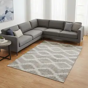 Photo of Tan Ivory And Beige Tribal Washable Area Rug With UV Protection