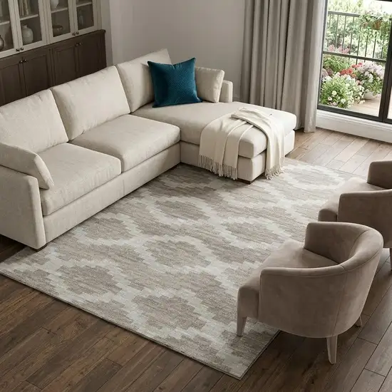 Tan Ivory And Beige Tribal Washable Area Rug With UV Protection Photo 1