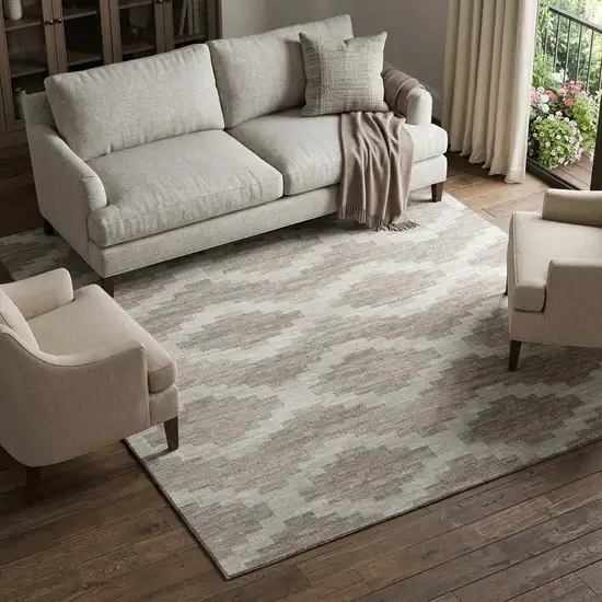 Tan Ivory And Beige Tribal Washable Area Rug With UV Protection Photo 1