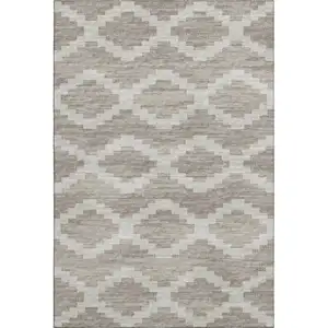 Photo of Tan Ivory And Beige Tribal Washable Area Rug With UV Protection