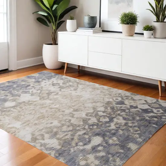 Ivory Tan And Blue Abstract Distressed Area Rug Photo 1