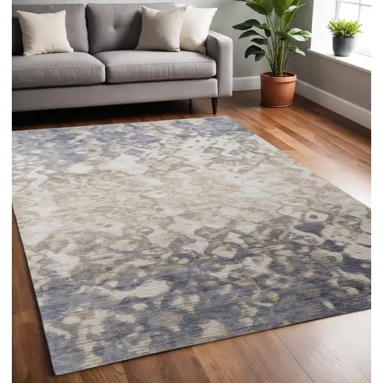 Ivory Tan And Blue Abstract Distressed Area Rug Photo 1