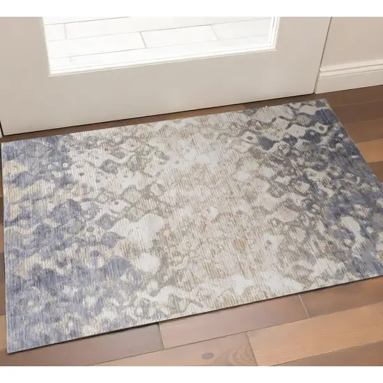 Ivory Tan And Blue Abstract Distressed Area Rug Photo 1
