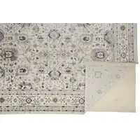 Photo of Tan Ivory And Blue Floral Stain Resistant Area Rug