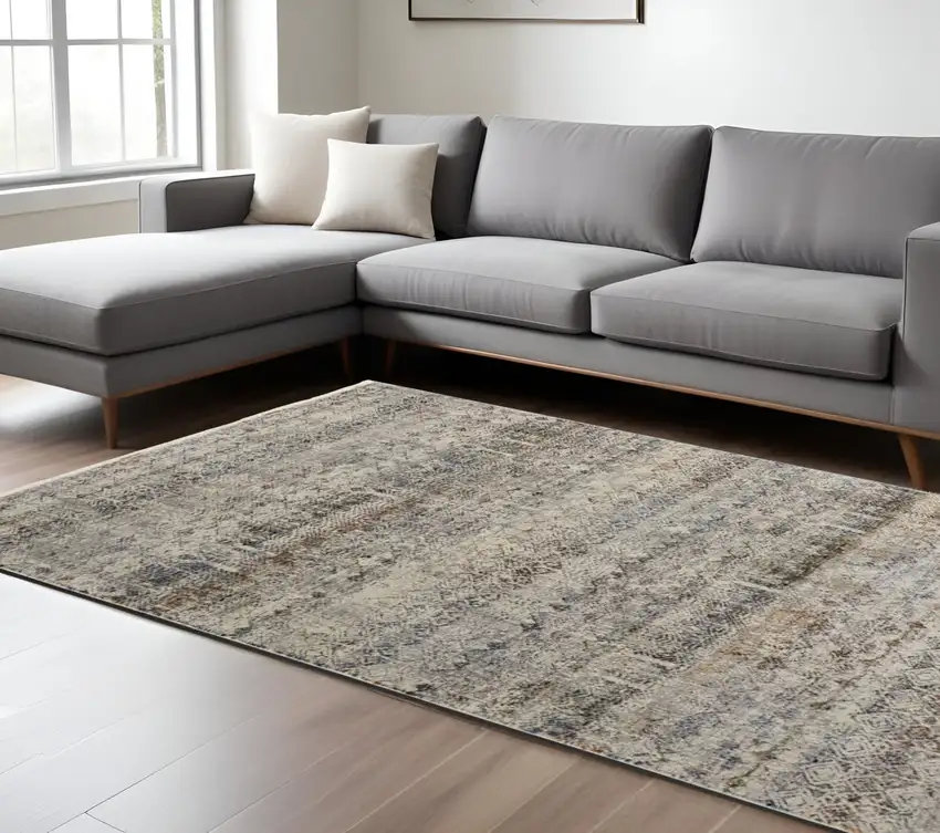 Tan and Ivory Geometric Power Loom Distressed Non Skid Area Rug With Fringe Photo 1