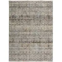 Photo of Tan Ivory And Blue Geometric Power Loom Distressed Area Rug With Fringe