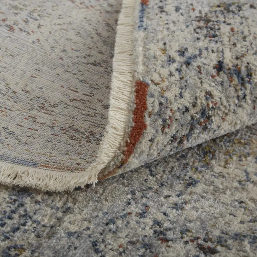 Tan Ivory And Blue Geometric Power Loom Distressed Area Rug With Fringe Photo 9