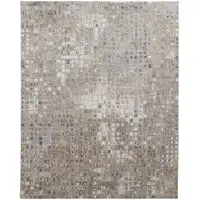 Photo of Tan Ivory And Blue Geometric Power Loom Distressed Area Rug