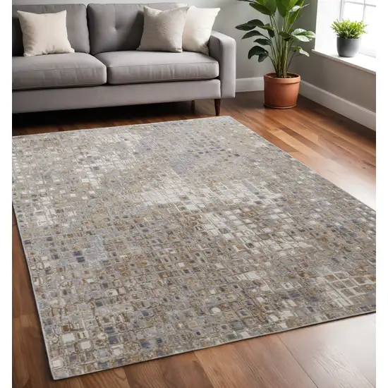 Tan Ivory And Blue Geometric Distressed Area Rug Photo 1