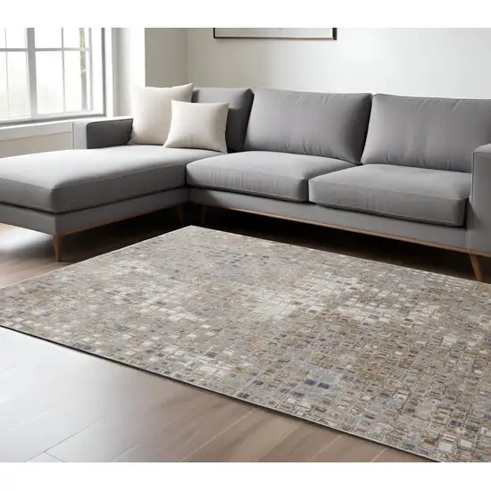 Tan Ivory And Blue Geometric Power Loom Distressed Area Rug Photo 1