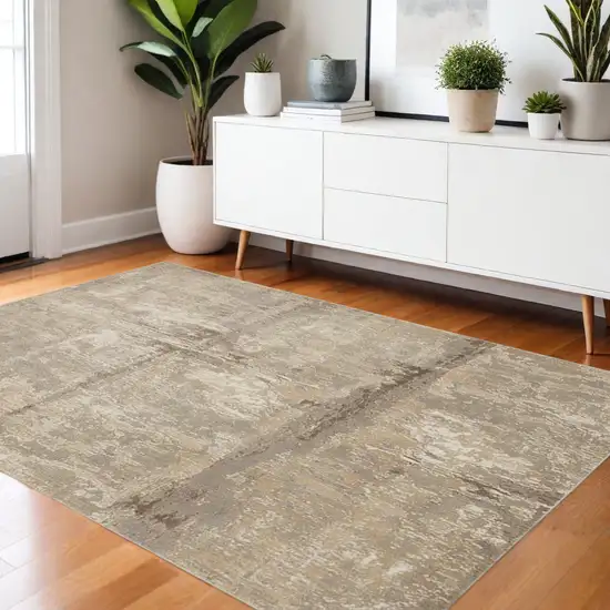Tan Ivory And Brown Abstract Area Rug Photo 1