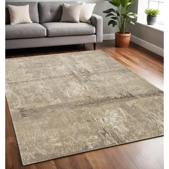 Tan Ivory And Brown Abstract Area Rug Photo 1