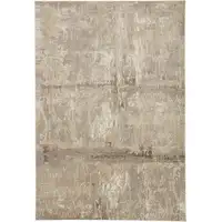 Photo of Tan Ivory And Brown Abstract Area Rug