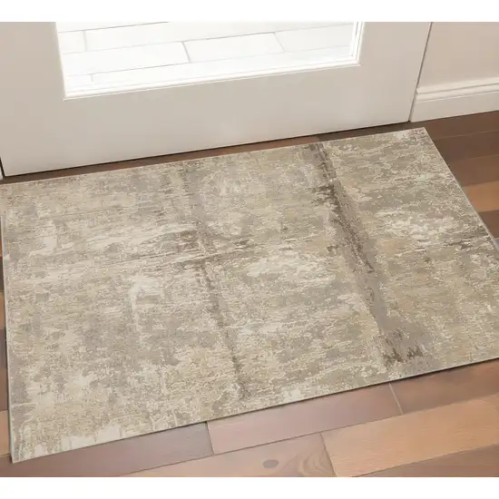 Tan Ivory And Brown Abstract Area Rug Photo 1