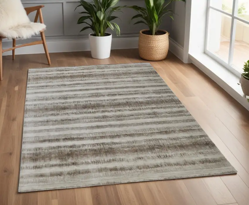Tan and Ivory Abstract Hand Woven Area Rug Photo 1