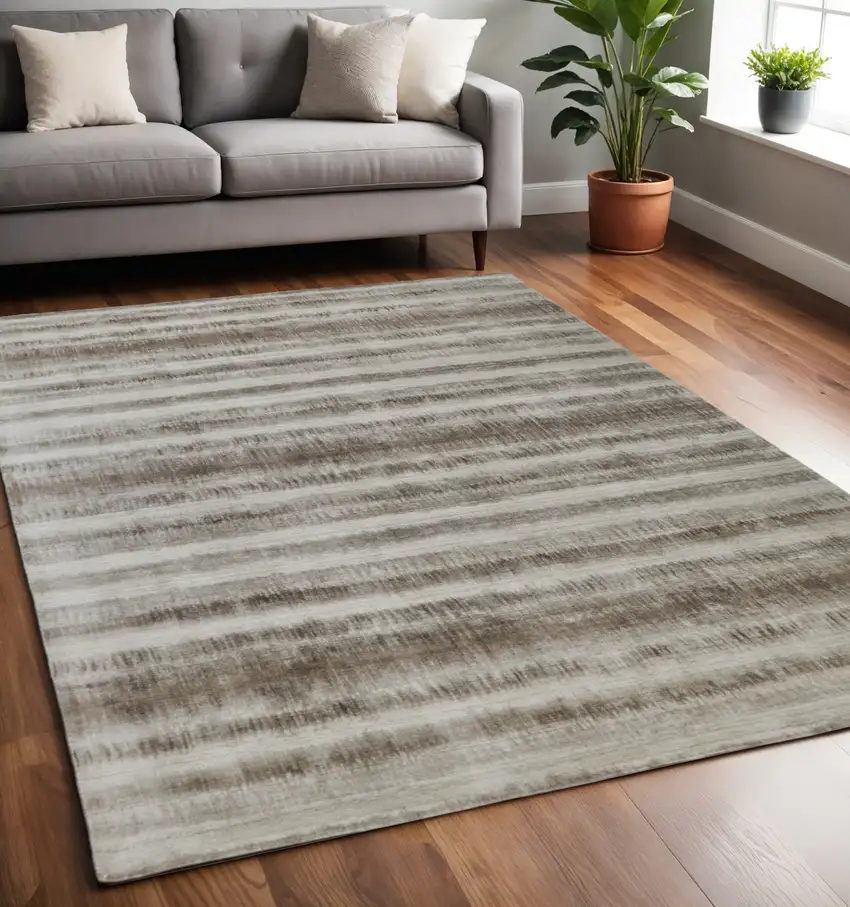 Tan and Ivory Abstract Hand Woven Area Rug Photo 1