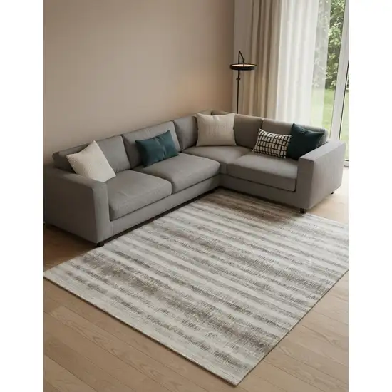 Tan Ivory And Brown Abstract Hand Woven Area Rug Photo 1