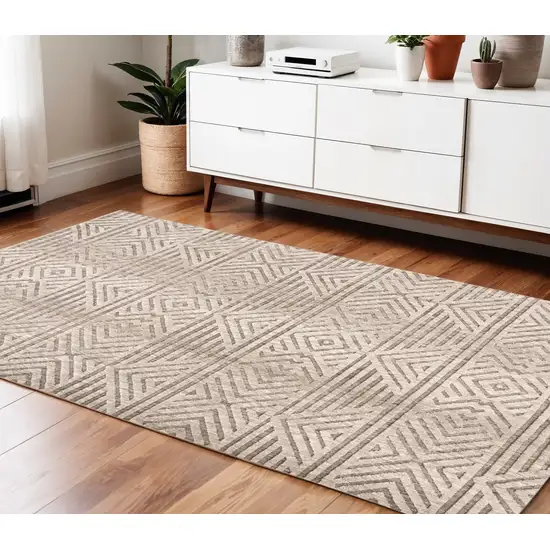 Tan Ivory And Brown Geometric Stain Resistant Area Rug Photo 1