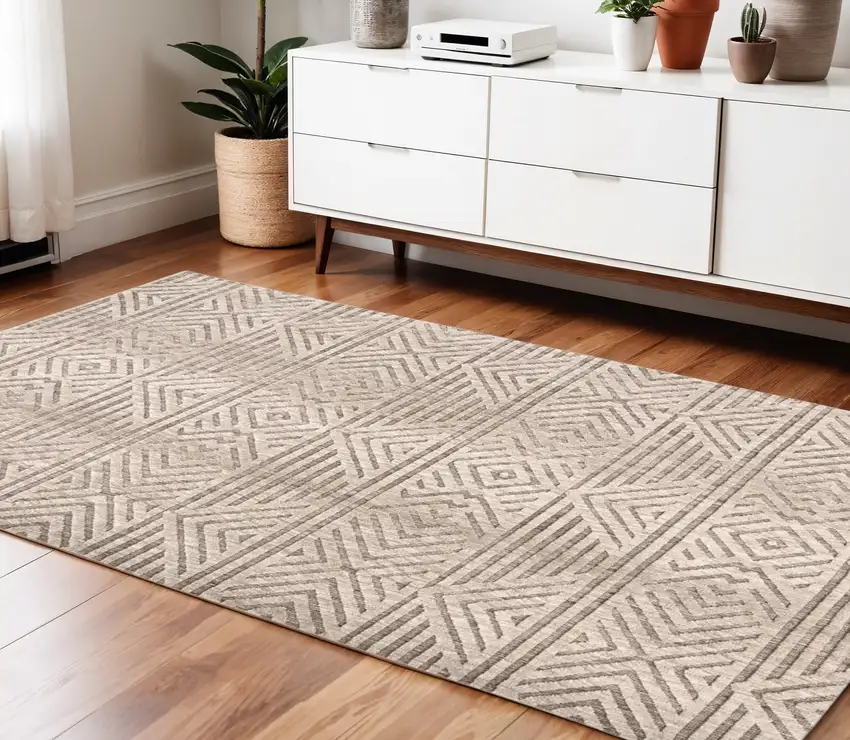 Tan Ivory And Brown Geometric Stain Resistant Area Rug Photo 1