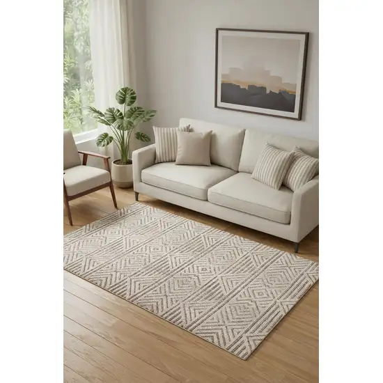 Tan Ivory And Brown Geometric Stain Resistant Area Rug Photo 1