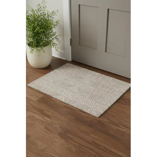 Tan Ivory And Brown Geometric Stain Resistant Area Rug Photo 1