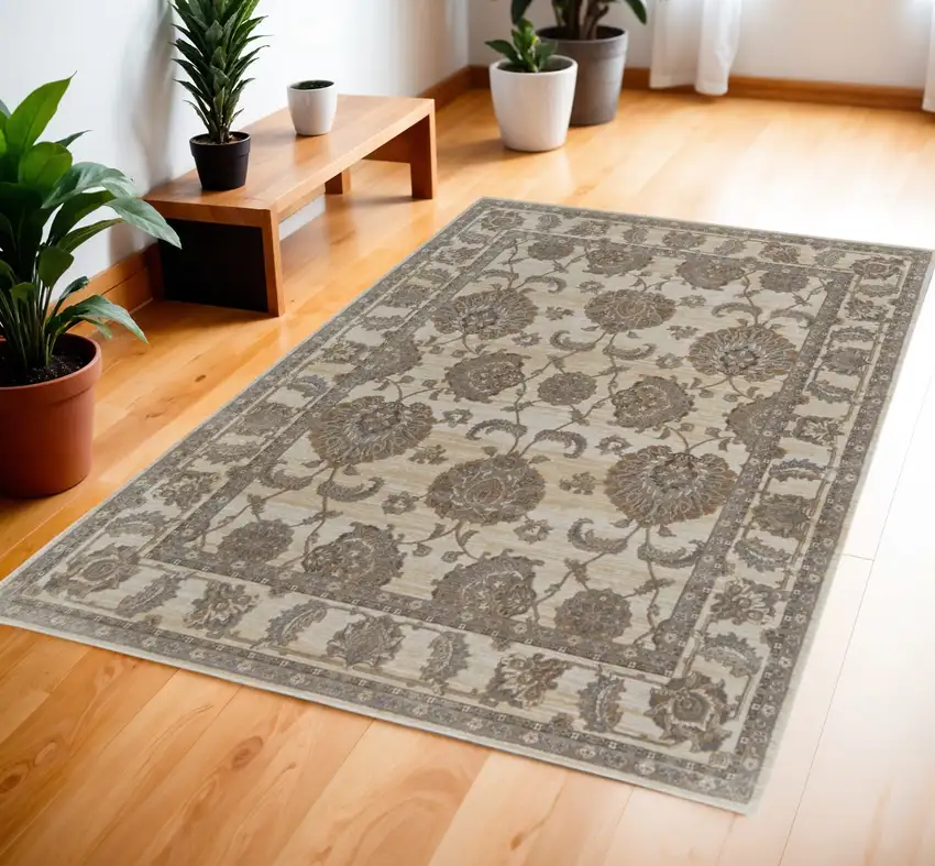 Tan Ivory And Brown Power Loom Area Rug Photo 1