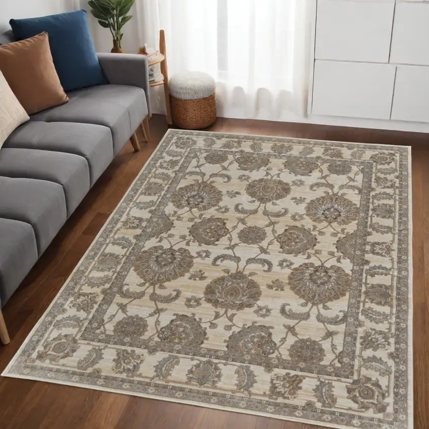 Tan Ivory And Brown Power Loom Area Rug Photo 1