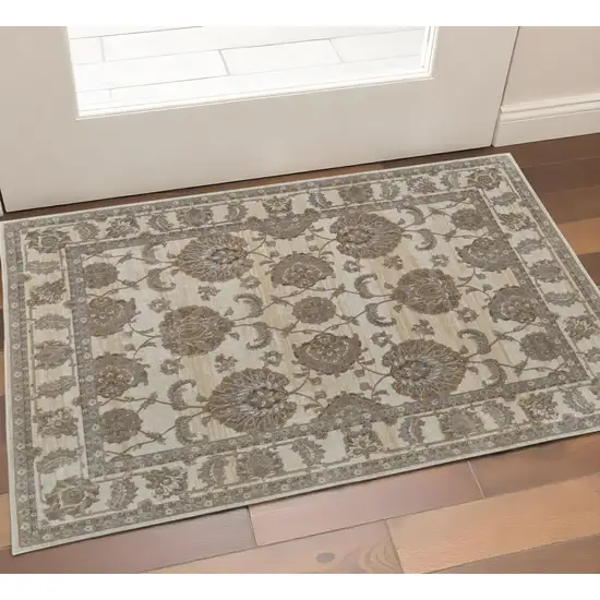 Tan And Brown Oriental Area Rug Photo 1