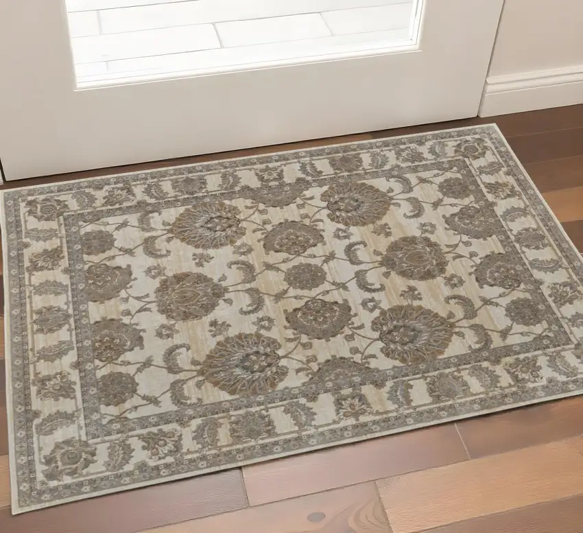 Tan And Brown Oriental Area Rug Photo 1